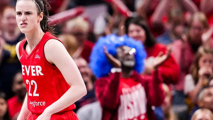 Indiana Fever guard Caitlin Clark reacts to scoring a 3-pointer Saturday, May 17, 2025, during a game against the Chicago Sky at Gainbridge Fieldhouse in Indianapolis.