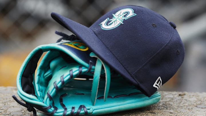 May 12, 2018; Detroit, MI, USA; Hat and glove of Seattle Mariners center fielder Dee Gordon (9) sits in dugout during the third inning against the Detroit Tigers at Comerica Park. 