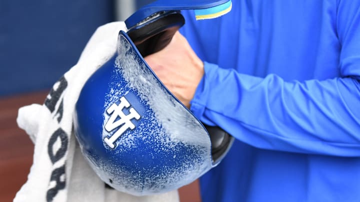 Apr 6, 2025; Philadelphia, Pennsylvania, USA; Los Angeles Dodgers batting helmet gets cleaned up before game against the Philadelphia Phillies at Citizens Bank Park. Mandatory Credit: Eric Hartline-Imagn Images Apr 6, 2025; Philadelphia, Pennsylvania, USA; Los Angeles Dodgers batting helmet gets cleaned up before game against the Philadelphia Phillies at Citizens Bank Park. Mandatory Credit: Eric Hartline-Imagn Images