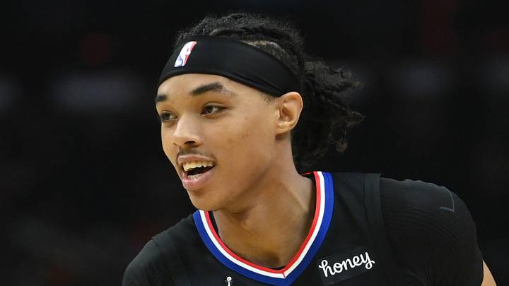 Los Angeles Clippers guard Brandon Boston Jr. (4) reacts after scoring a three point basket against the Boston Celtics during the first half at Staples Center on December 8, 2021.