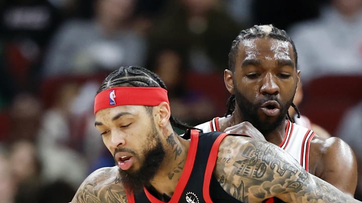 Chicago Bulls forward Patrick Williams defends against Toronto Raptors forward Brandon Ingram.
