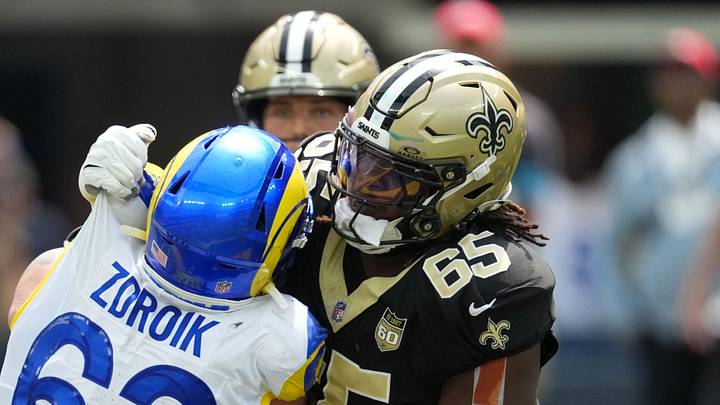 Aug 22, 2026; Inglewood, California, USA; New Orleans Saints guard Jeremiah Wright (65) defends against Los Angeles Rams defensive tackle Payton Zdroik (62) in the first half at SoFi Stadium. Mandatory Credit: Kirby Lee-Imagn Images