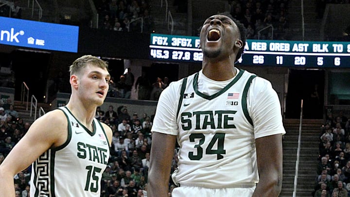 Michigan State forward Xavier Booker celebrates a basket and foul against Penn State.