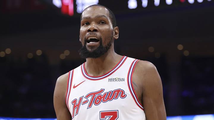 Apr 1, 2026; Houston, Texas, USA; Houston Rockets forward Kevin Durant (7) reacts with a fan in the crowd during the fourth quarter against the Milwaukee Bucks at Toyota Center. Mandatory Credit: Troy Taormina-Imagn Images