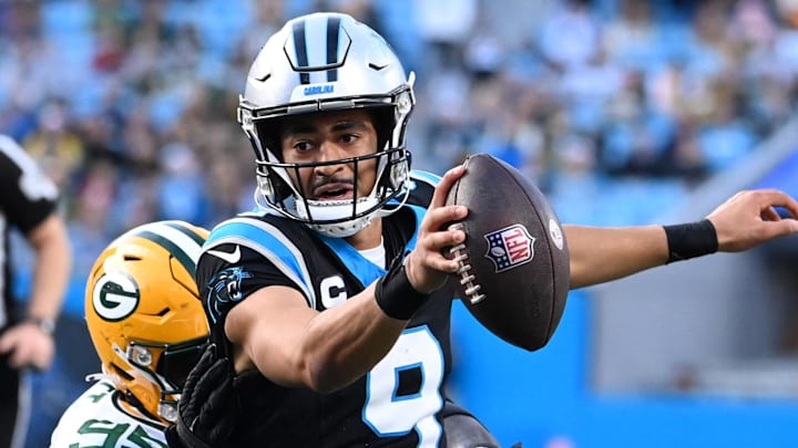 Carolina Panthers quarterback Bryce Young (9) scrambles against the Green Bay Packers in 2023.