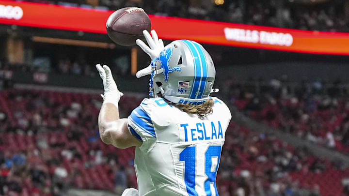 Detroit Lions wide receiver Isaac TeSlaa (18) catches a touchdown pass behind Atlanta Falcons cornerback Dee Alford (20) 