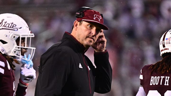 Mississippi State Bulldogs coach Jeff Lebby speaks with players between plays against the Eastern Kentucky Colonels during the third quarter at Davis Wade Stadium at Scott Field.