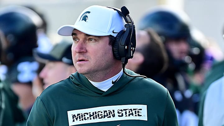 Nov 2, 2024; East Lansing, Michigan, USA; Michigan State Spartans head coach Jonathan Smith looks over his sidelines during the first quarter against the Indiana Hoosiers at Spartan Stadium. Mandatory Credit: Dale Young-Imagn Images Nov 2, 2024; East Lansing, Michigan, USA; Michigan State Spartans head coach Jonathan Smith looks over his sidelines during the first quarter against the Indiana Hoosiers at Spartan Stadium. Mandatory Credit: Dale Young-Imagn Images
