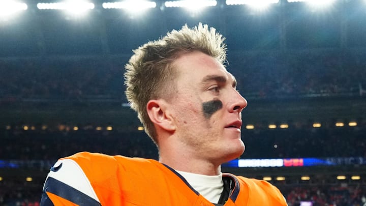 Jan 17, 2026; Denver, CO, USA; Denver Broncos quarterback Bo Nix (10) and offensive tackle Garett Bolles (72) celebrate after winning an AFC Divisional Round playoff game against the Buffalo Bills at Empower Field at Mile High. M