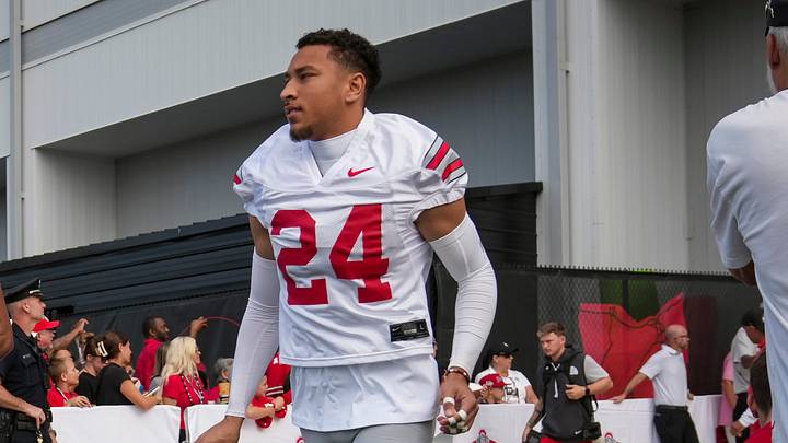 Ohio State Buckeyes cornerback Dominick Kelly (24) and cornerback Jay Timmons (25) take the field during the first practice of training camp at the Woody Hayes Athletic Center in Columbus on Aug. 6, 2026.
