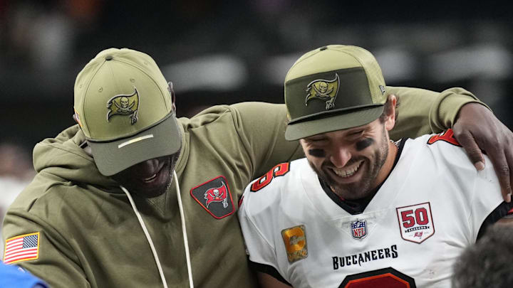 Tampa Bay Buccaneers head coach Todd Bowles and quarterback Baker Mayfield (6) celebrate a win over the New Orleans Saints