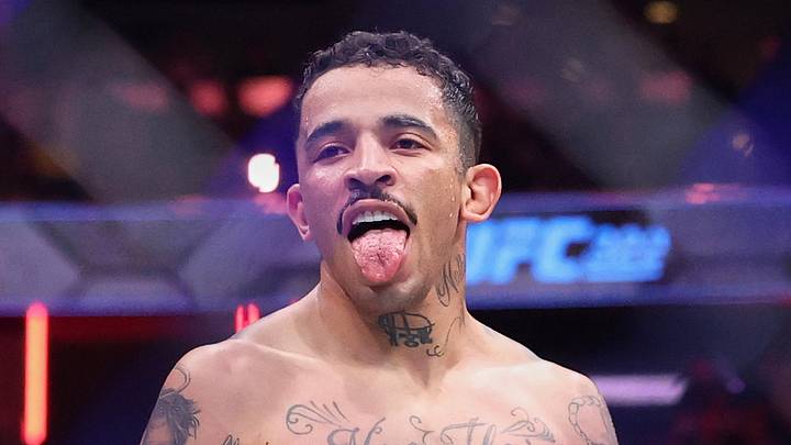 Nov 15, 2025; New York, NY, UNITED STATES; Carlos Prates (blue gloves) reacts after defeating Leon Edwards (not pictured) in the welterweight bout during UFC 322 at Madison Square Garden. Mandatory Credit: Ed Mulholland-Imagn Images