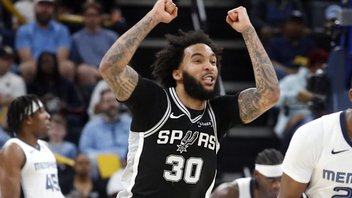 Mar 25, 2026; Memphis, Tennessee, USA; San Antonio Spurs forward Julian Champagnie (30) reacts after a basket during the third quarter against the Memphis Grizzlies at FedExForum. Mandatory Credit: Petre Thomas-Imagn Images