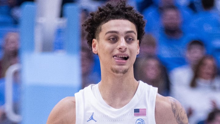 Dec 16, 2025; Chapel Hill, North Carolina, USA; North Carolina Tar Heels guard Kyan Evans (0) brings the ball up court during the second half against the ETSU Buccaneers at Dean E. Smith Center. Mandatory Credit: Scott Kinser-Imagn Images Dec 16, 2025; Chapel Hill, North Carolina, USA; North Carolina Tar Heels guard Kyan Evans (0) brings the ball up court during the second half against the ETSU Buccaneers at Dean E. Smith Center. Mandatory Credit: Scott Kinser-Imagn Images