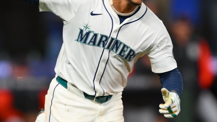 Oct 10, 2025; Seattle, Washington, USA; Seattle Mariners second baseman Jorge Polanco (7) hits a walk off single against the Detroit Tigers during the fifteenth inning during game five of the ALDS round for the 2025 MLB playoffs at T-Mobile Park.  Mandatory Credit: Steven Bisig-Imagn Images