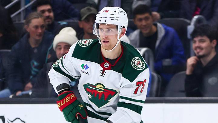 Dec 8, 2025; Seattle, Washington, USA; Minnesota Wild center Nico Sturm (78) moves the puck in the second period against the Seattle Kraken at Climate Pledge Arena. Mandatory Credit: Kevin Ng-Imagn Images