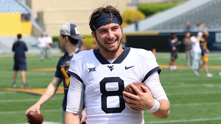 West Virginia University quarterback Nicco Marchiol warming up prior to the 2024 Gold-Blue Spring Game. West Virginia University quarterback Nicco Marchiol warming up prior to the 2024 Gold-Blue Spring Game.