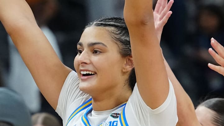 Apr 3, 2026; Phoenix, AZ, USA; UCLA Bruins center Lauren Betts (51) celebrates with teammates after defeating the Texas Longhorns during a semifinal of the Final Four of the women's 2026 NCAA Tournament at Mortgage Matchup Center. Mandatory Credit: Kirby Lee-Imagn Images