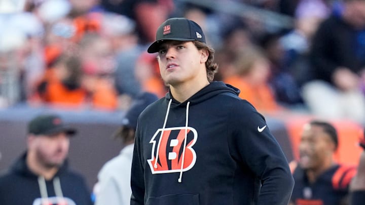 Injured Cincinnati Bengals defensive end Trey Hendrickson (91) walks the sideline in the fourth quarter of the NFL Week 12 game between the Cincinnati Bengals and the New England Patriots at Paycor Stadium in downtown Cincinnati on Sunday, Nov. 23, 2025. The Bengals fall to 3-8 with a 26-20 loss at home.