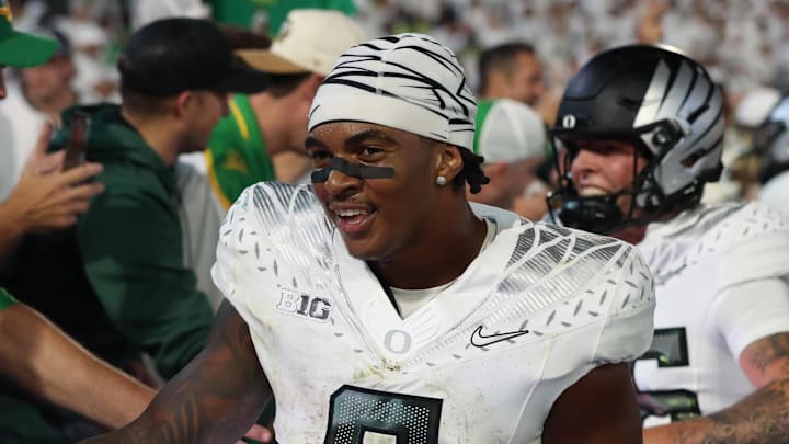 Jordon Davison freshman College Football Oregon Ducks Rutgers Scarlet Knights Wisconsin Badgers Big Ten running back PFF grade bryce underwood michigan wolverines