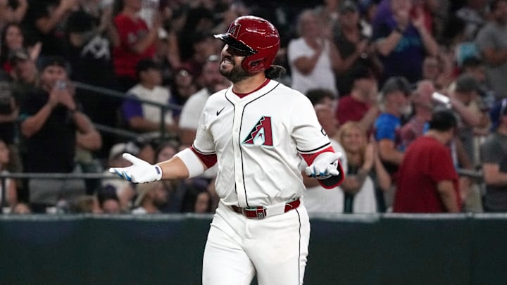 Jul 19, 2025; Phoenix, Arizona, USA; Arizona Diamondbacks third base Eugenio Suarez (28) reacts after hitting a solo home run against the St. Louis Cardinals in the third inning at Chase Field. Mandatory Credit: Rick Scuteri-Imagn Images