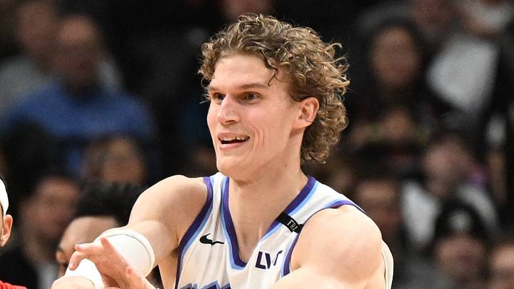 Feb 1, 2026; Toronto, Ontario, CAN;  Utah Jazz forward Lauri Markkanen (23) passes the ball away from Toronto Raptors forward Brandon Ingram (3) in the first half at Scotiabank Arena. Mandatory Credit: Dan Hamilton-Imagn Images