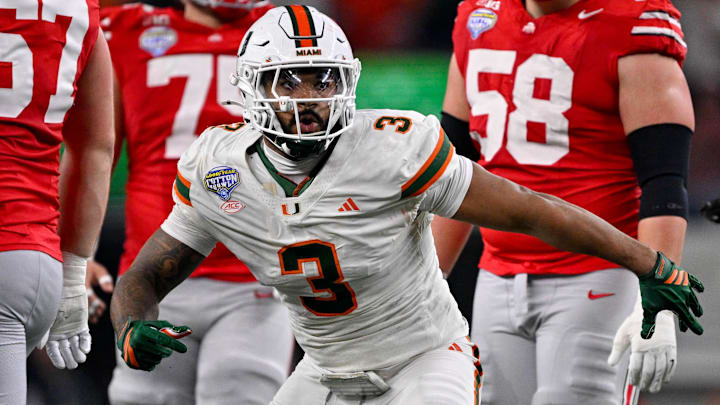 Dec 31, 2025; Arlington, TX, USA; Miami Hurricanes defensive lineman Akheem Mesidor (3) celebrates after he sacks Ohio State Buckeyes quarterback Julian Sayin (not pictured) during the 2025 Cotton Bowl and quarterfinal game of the College Football Playoff at AT&T Stadium. Mandatory Credit: Jerome Miron-Imagn Images