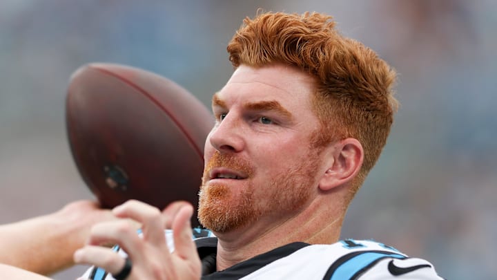 Carolina Panthers quarterback Andy Dalton warms up during the first quarter against the Miami Dolphins. Carolina Panthers quarterback Andy Dalton warms up during the first quarter against the Miami Dolphins.