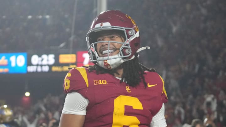 Nov 29, 2025; Los Angeles, California, USA; Southern California Trojans wide receiver Makai Lemon (6) celebrates after catching a 32-yard touchdown pass against the UCLA Bruins in the second half at United Airlines Field at Los Angeles Memorial Coliseum. 