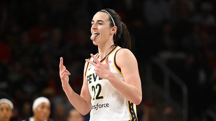 Indiana Fever guard Caitlin Clark (22) reacts after making a three-point basket