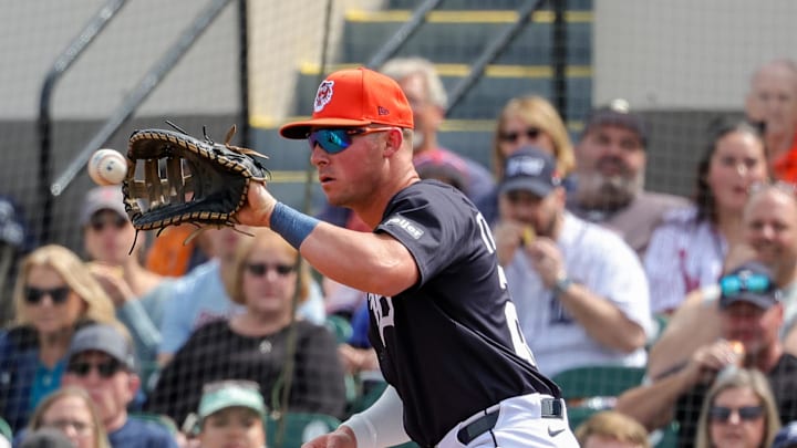 Feb 22, 2025; Lakeland, Florida, USA; Detroit Tigers first base Spencer Torkelson (20) catches a ball for an out at first during the first inning against the Philadelphia Phillies at Publix Field at Joker Marchant Stadium. Feb 22, 2025; Lakeland, Florida, USA; Detroit Tigers first base Spencer Torkelson (20) catches a ball for an out at first during the first inning against the Philadelphia Phillies at Publix Field at Joker Marchant Stadium.
