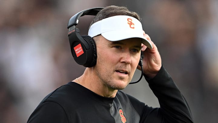 Sep 13, 2025; West Lafayette, Indiana, USA; Southern California Trojans head coach Lincoln Riley stands on the sidelines during the first quarter against the Purdue Boilermakers at Ross-Ade Stadium. Mandatory Credit: Marc Lebryk-Imagn Images