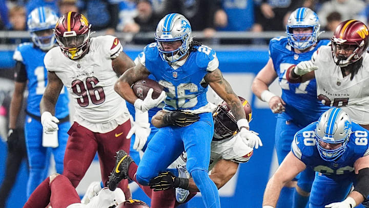 Detroit Lions running back Jahmyr Gibbs (26) runs against Washington Commanders during the first half of the NFC divisional round at Ford Field in Detroit on Saturday, Jan. 18, 2025. Detroit Lions running back Jahmyr Gibbs (26) runs against Washington Commanders during the first half of the NFC divisional round at Ford Field in Detroit on Saturday, Jan. 18, 2025.