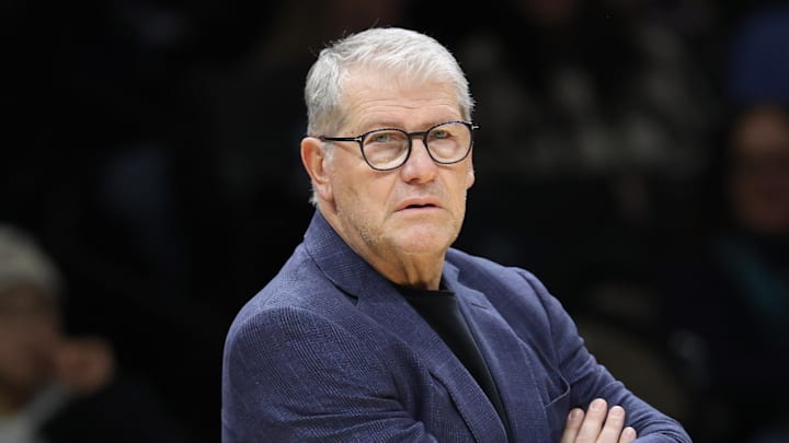 Dec 20, 2025; Brooklyn, New York, USA; UConn Huskies head coach Geno Auriemma stands on the court during the first half against the Iowa Hawkeyes at Barclays Center. Mandatory Credit: Pamela Smith-Imagn Images