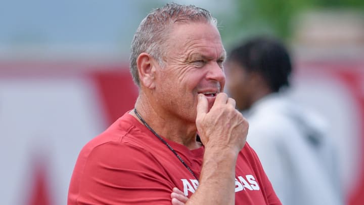 Arkansas Razorbacks coach Sam Pittman watching preseason practices outdoors in Fayetteville, Ark. Arkansas Razorbacks coach Sam Pittman watching preseason practices outdoors in Fayetteville, Ark.