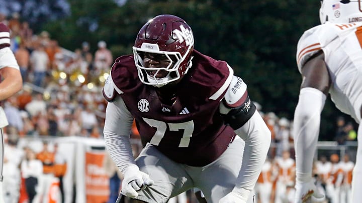 Oct 25, 2025; Starkville, Mississippi, USA; Mississippi State Bulldogs offensive linemen Jayvin Q. James (77) waits for the snap during the third quarter against the Texas Longhorns at Davis Wade Stadium at Scott Field. Mandatory Credit: Petre Thomas-Imagn Images