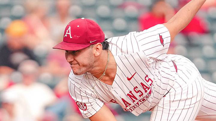 Arkansas Razorbacks pitcher James DeCremer throwing against Arkansas State. Arkansas Razorbacks pitcher James DeCremer throwing against Arkansas State.