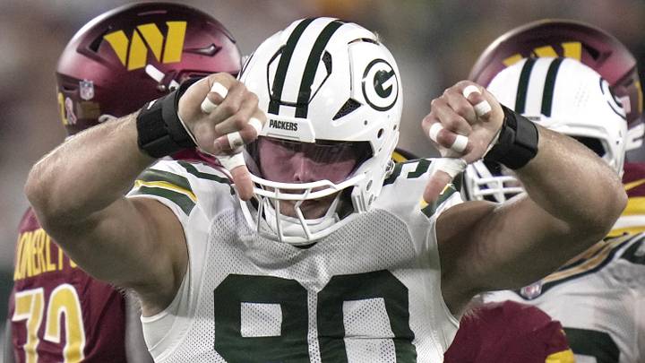 Green Bay Packers defensive end Lukas Van Ness (90) celebrates tacking Washington Commanders running back Austin Ekeler. Green Bay Packers defensive end Lukas Van Ness (90) celebrates tacking Washington Commanders running back Austin Ekeler.