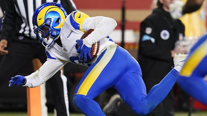 Dec 12, 2024; Santa Clara, California, USA; Los Angeles Rams cornerback Darious Williams (24) holds onto the ball after intercepting a pass against the San Francisco 49ers in the fourth quarter at Levi's Stadium. Mandatory Credit: Cary Edmondson-Imagn Images