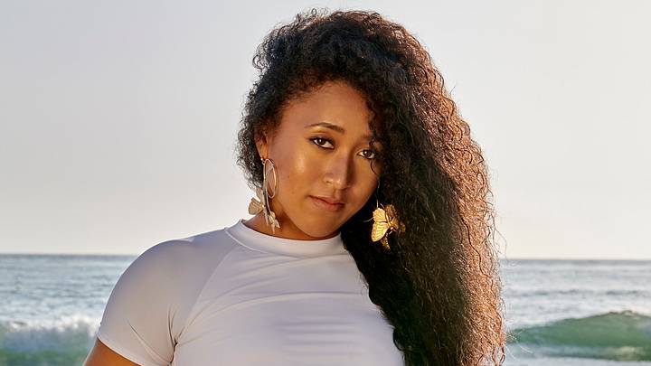 Naomi Osaka was photographed by Yu Tsai in Malibu, Calif. Swimsuit by MIKOH. Top by Love Label. Earrings by Beads Byaree.