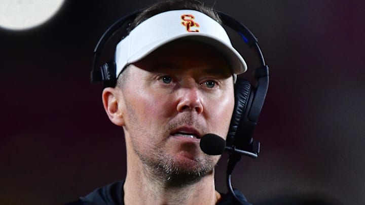 Nov 7, 2025; Los Angeles, California, USA; Southern California Trojans head coach Lincoln Riley watches game action against the Northwestern Wildcats during the second half at the Los Angeles Memorial Coliseum. Mandatory Credit: Gary A. Vasquez-Imagn Images
