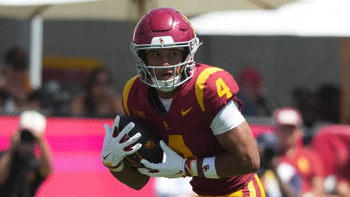 Aug 29, 2026; Los Angeles, California, USA;  Southern California Trojans wide receiver Trent Mosley (4) carries the ball against the San Jose State Spartans at United Airlines Field at Los Angeles Memorial Coliseum. Mandatory Credit: Kirby Lee-Imagn Images