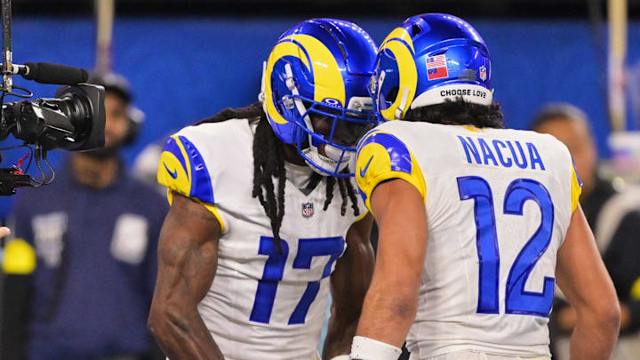 Nov 23, 2025; Inglewood, California, USA; Los Angeles Rams wide receiver Davante Adams (17) celebrates with wide receiver Puka Nacua (12) after scoring a touchdown against the Tampa Bay Buccaneers during the second quarter at SoFi Stadium.  Mandatory Credit: Jayne Kamin-Oncea-Imagn Images