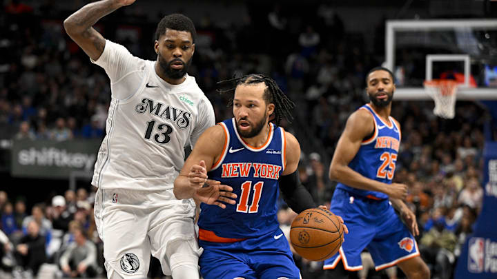Nov 27, 2024; Dallas, Texas, USA; Dallas Mavericks forward Naji Marshall (13) and New York Knicks guard Jalen Brunson (11) in action during the game between the Dallas Mavericks and the New York Knicks at the American Airlines Center. Mandatory Credit: Jerome Miron-Imagn Images