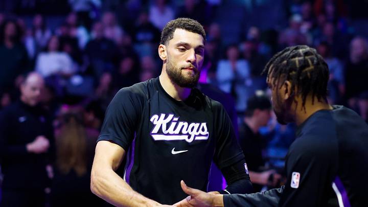 Jan 20, 2026; Sacramento, California, USA; Sacramento Kings guard Zach LaVine (8) is greeted by teammates during player introductions before the game against the Miami Heat at Golden 1 Center. Mandatory Credit: Sergio Estrada-Imagn Images