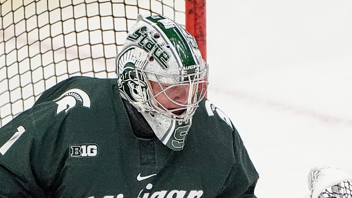 Michigan State goaltender Trey Augustine (1) warms up before Duel in the D between Michigan and Michigan State at Little Caesars Arena in Detroit on Saturday, Feb. 8, 2025.