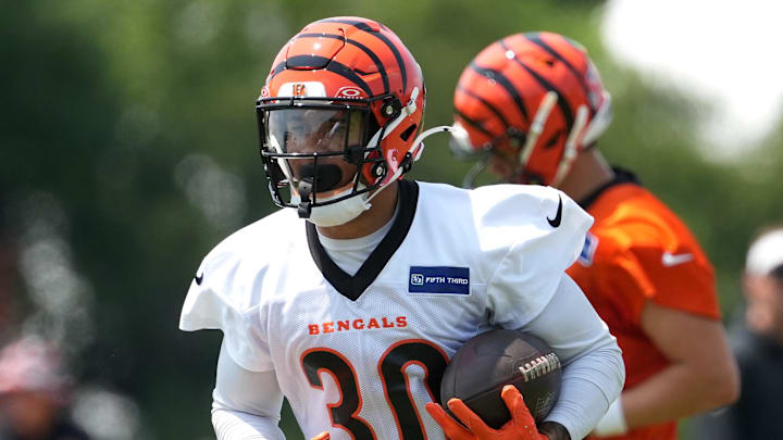 Jun 10, 2025; Cincinnati, OH, USA; Cincinnati Bengals running back Chase Brown (30) carries the ball during practice at Paycor Stadium. Mandatory Credit: Kareem Elgazzar-Imagn Images