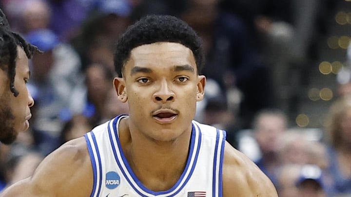 Mar 29, 2026; Washington, DC, USA; Duke Blue Devils guard Caleb Foster (1) dribbles the ball as UConn Huskies guard Malachi Smith (0) defends in the first half during an Elite Eight game of the East Regional of the men's 2026 NCAA Tournament at Capital One Arena. Mandatory Credit: Amber Searls-Imagn Images Mar 29, 2026; Washington, DC, USA; Duke Blue Devils guard Caleb Foster (1) dribbles the ball as UConn Huskies guard Malachi Smith (0) defends in the first half during an Elite Eight game of the East Regional of the men's 2026 NCAA Tournament at Capital One Arena. Mandatory Credit: Amber Searls-Imagn Images