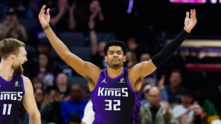 Jan 16, 2026; Sacramento, California, USA; Sacramento Kings center Dylan Cardwell (32) celebrates after a dunk during the second quarter against the Washington Wizards at Golden 1 Center.