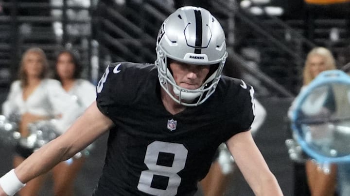 Jan 4, 2026; Paradise, Nevada, USA; Las Vegas Raiders place kicker Daniel Carlson (8 kicks a 60-yard field goal out of the hold of punter AJ Cole (6) with eight seconds left against the Kansas City Chiefs at Allegiant Stadium. Mandatory Credit: Kirby Lee-Imagn Images Jan 4, 2026; Paradise, Nevada, USA; Las Vegas Raiders place kicker Daniel Carlson (8 kicks a 60-yard field goal out of the hold of punter AJ Cole (6) with eight seconds left against the Kansas City Chiefs at Allegiant Stadium. Mandatory Credit: Kirby Lee-Imagn Images